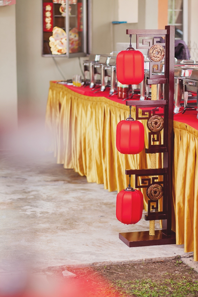 Red Lanterns on Carved Wooden Stand